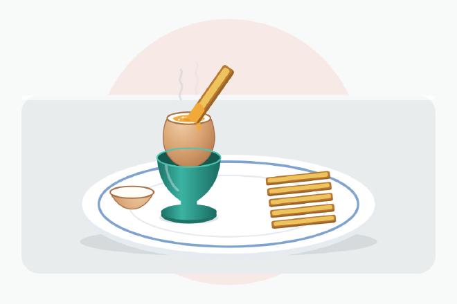 Unpeeled soft-boiled egg in a ceramic egg cup with its cap sliced off to show a runny yolk, and several buttered toast soldiers lined up beside it