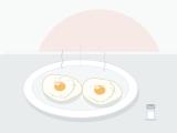 Two poached eggs with a firmly set white on a plate, a rounded glossy yolk visible under a thin veil of egg white
