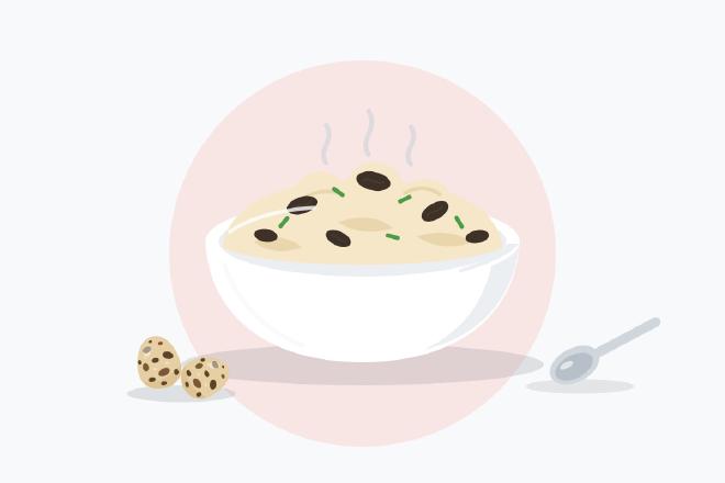 Illustration of creamy scrambled eggs with dark truffle slices and chives in a white bowl beside a spoon