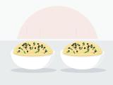 Illustration of two white bowls of scrambled quail eggs in small soft, set curds, topped with finely grated black truffle and chopped chives